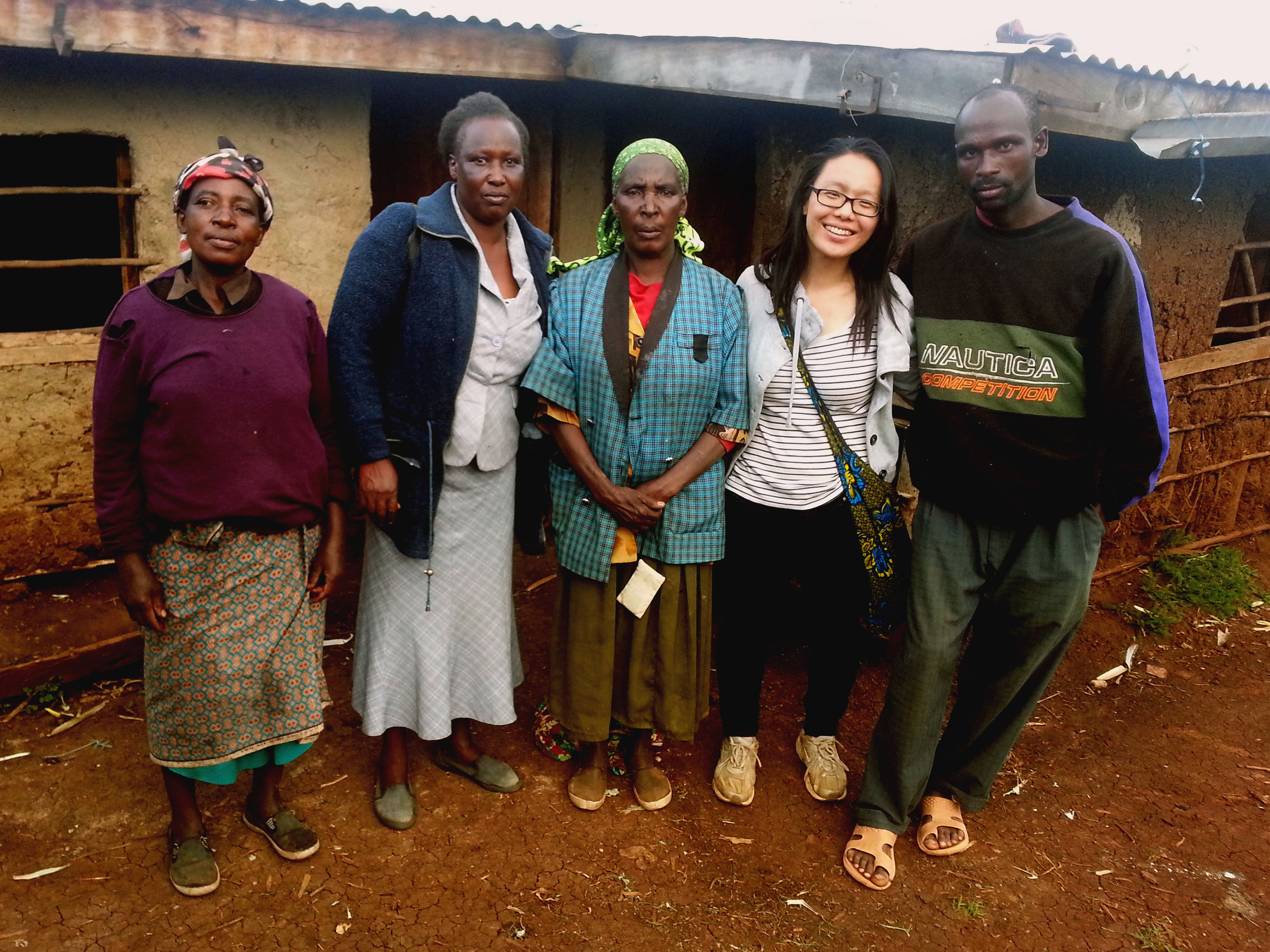 Photo with my CHW and village elder (study participant).jpg